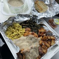 Country Breakfast and Half Biscuit with gravy  at Three Carrots - Fountain Square in Indianapolis