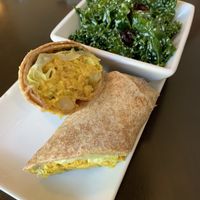 Chickpea wrap and kale salad. Delicious  at Plum Cafe in Roswell