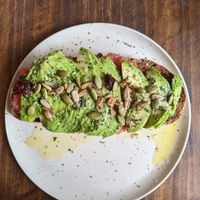 Avocado tomato tosta at El Campesino Burger in Madrid