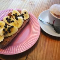 Breakfast with peanut butter and oat milk cappuccino at El Campesino Burger in Madrid
