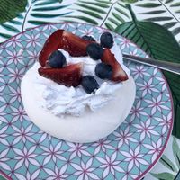 Meringue with whipped cream (all vegan🥰🍃) and fruits on top #deliciousss #pychaa 😋 at Kuchnia PoWolność in Poznan