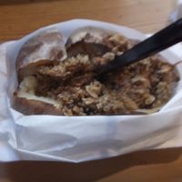 Medium baked potato with hot vegan haggis topping. Great with brown sauce :) at The Baked Potato Shop in Edinburgh