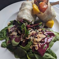 Vegan mango wrap with spinach salad with blueberry dressing at The Food and Art Cafe in Whitby