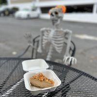 Peanut butter cheeze cake and our seat mate    at Herbivores in Kailua Kona