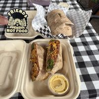 Crunch wrap and Ceasar wrap (and sticker!)  at Herbivores in Kailua Kona