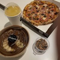 Ordered by Grab delivery: Puttanesca pizza, banana cacao bowl and passion fruit and mango smoothie  at Goodsouls Kitchen in Chiang Mai