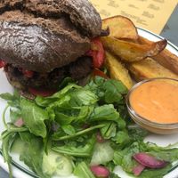Juicy black bean burger at Het Strand - The Strand in Leuven