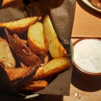 Wedges with a creamy sauce #Veganuary at Het Strand - The Strand in Leuven