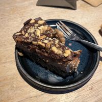 The peanut-chocolate cheesecake is delicious!   at Het Strand - The Strand in Leuven