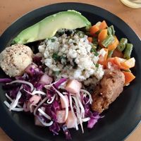Salad, croquet, rice with peanuts, puree of garbanzos with sesame seeds on top, slice of avocado, mixed cooked veggies at El Arbol de la Vida - Maybe closed in Medellin