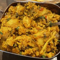 Vegan/Gluten free Aloo Gobi, cauliflower and potatoes cooked in a nice curry mix. Served with basmati rice.   at An Indian Affair in Langley