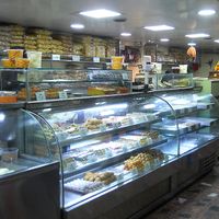 sweets and cash counter (on the right, pay here first) at Gautam Sweets - Tip Top in Kathmandu