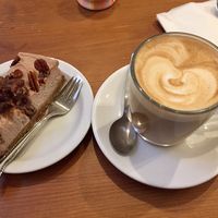 Pecan “cheesecake” and oat milk latte   at Sundowners in Exmouth