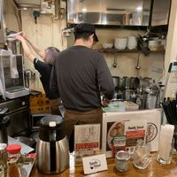 the chefs in their kitchen  at Noodle Stand in Tokyo