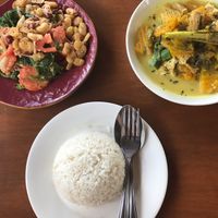 Tomato salad, pumpkin curry with coconut milk at Paw Paw in Nyaungshwe