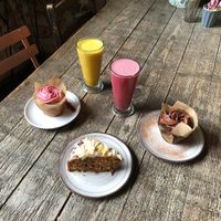 Beetroot latte, tumeric latte, vegan chocolate muffin, vegan raspberry muffin, vegan carrot and coconut cake at W6 Garden Centre Cafe in West London