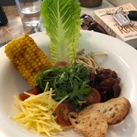 Cobb Salad - Chick'n, Cheese, Baby Gem, Rocket Leaves Tomatoes, Cajun Corn on the Cobb at Eat Street in Belfast