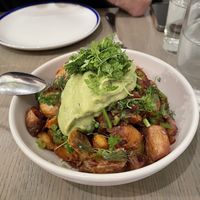 Potatoes with jalapeño and avocado cream   at Ten Foot Henry in Calgary