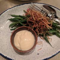 Green beans with fried onions and aioli at Ten Foot Henry in Calgary