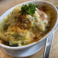 Baked spinach with vegan cheese, 125 baht  at Yes Vegan in Pattaya