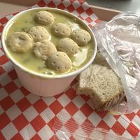 Lime and coconut chowder with oyster crackers and side of sourdough bread   at Pike Place Chowder in Seattle