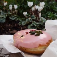 Vegan pomegranate and orange blossom doughnut at Crosstown Doughnuts - Victoria in London