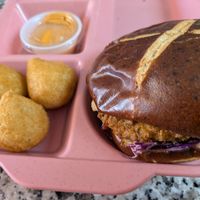 Signature fried chicken sandwich and half of the jalapeno poppers at Veggy Street in Las Vegas