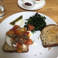 The tomatoes were on the other piece of toast, but I moved them over before I took the photo  at Footprint Cafes in Siem Reap