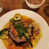 A dish with lentils, sweet potatoes, yam and brown rice at Vantra Vegan in London