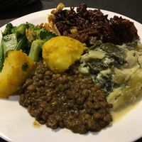 Selection of the warm and raw dishes - plate came to £10 at Vantra Vegan in London