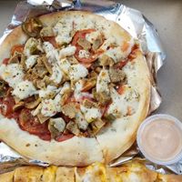 Pizza and Buffalo chicken calzone at Stromboli's Restaurant in Rochester