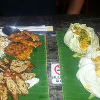 Vegan sausage, corn fritters, tempeh and spinach curry, pumpkin and tofu curry and rice. at V Secret Street Food - Food Stall in Chiang Mai