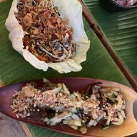 Tea leaf salad, tofu banana leaf fritters at V Secret Street Food - Food Stall in Chiang Mai
