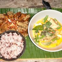Red curry w tofu and tempeh. Rice. Vegan Chiang mai sausage, cabbage salad. 100 bhat. at V Secret Street Food - Food Stall in Chiang Mai