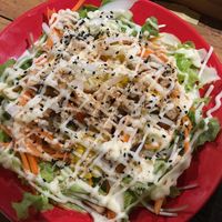 A giant plate of tempeh salad - only a very small amount of tempeh, but a fresh creamy salad at V Secret Street Food - Food Stall in Chiang Mai