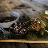 Vegetables in curry sauce with a side of rice and a spicy vegan sauce   at V Secret Street Food - Food Stall in Chiang Mai