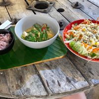 Curry with rice and big tempeh salad. at V Secret Street Food - Food Stall in Chiang Mai