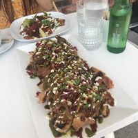 top dish: Vegan Rancheros, bottom dish: Vegan Kimchi Nachos at Rev-a-lee Brunch Cafe in Vineland