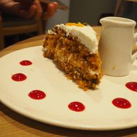 Vegan Carrot Cake [£4.50] served with a side of plant milk  at Henderson's Restaurant in Edinburgh