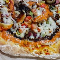 Unlimited toppings.  No daiya upcharge at Mod Pizza in Colorado Springs