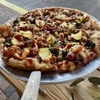 This vegan pizza had pineapple I forgot name tho  at Nice Guys Pizza and Beer in Cape Coral