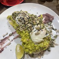 Smashed avocado and poached eggs  at Lifted Coffee & Brunch in Hanoi