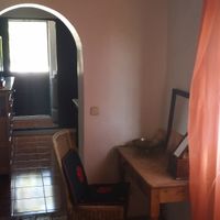 Upstairs Bedroom through Kitchenette to private terrace at Shangrila Hilltop Retreat in Loule