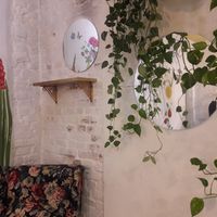 Interior with floral mural at Geranium Caffe in Poznan