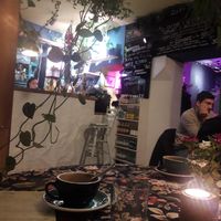 Inside with hot chocolate :) at Geranium Caffe in Poznan