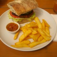 vegan burger with chips at Whole Earth Cafe in Cape Town