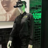 Waiter wears night vision goggles   at BLACKOUT Dining in the Dark in Las Vegas