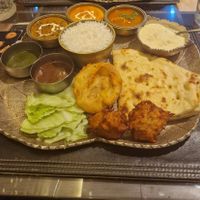 For perspective, the rice was able 4 tablespoons worth and the round dishes about 3 tables spoons of sauce, no real substance. at Kalpna in Edinburgh