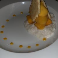 Rice pudding with mango sorbet, fresh mango and coconut crumble, last course of the set menu at The Pepper Tree in Phu Quoc