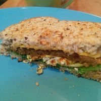 Breakfast sandwich, silken tofu, veg patty and it's delicious! at Cali Cafe in Cozumel